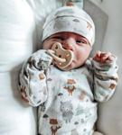 Smoczek anatomiczny dla niemowląt Milky White 0-3m  Hevea