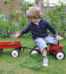Traktor dla dziecka z przyczepką jeździk Goki